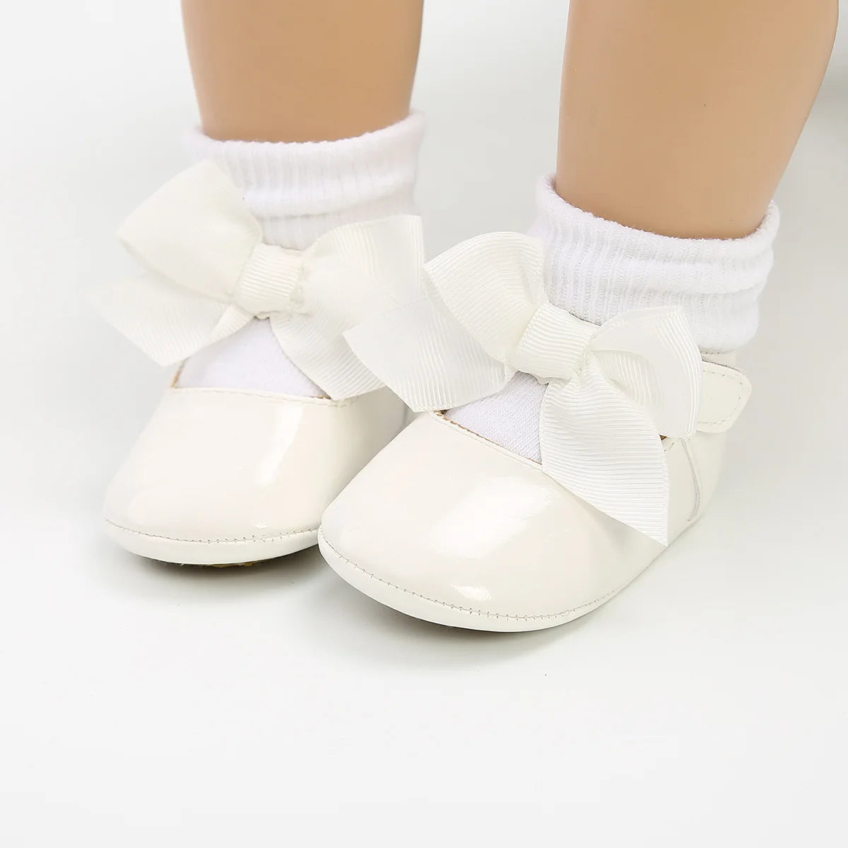 Zapatillas tipo Ballet con Moño: Elegancia Antideslizante para Bebé