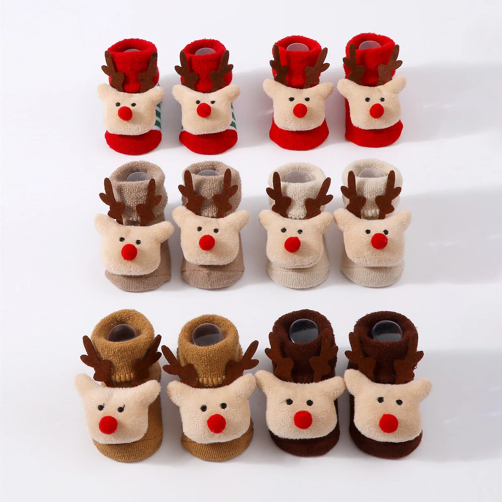 Calcetines Navideños Antideslizantes: La Magia y Seguridad en sus Primeros Pasos