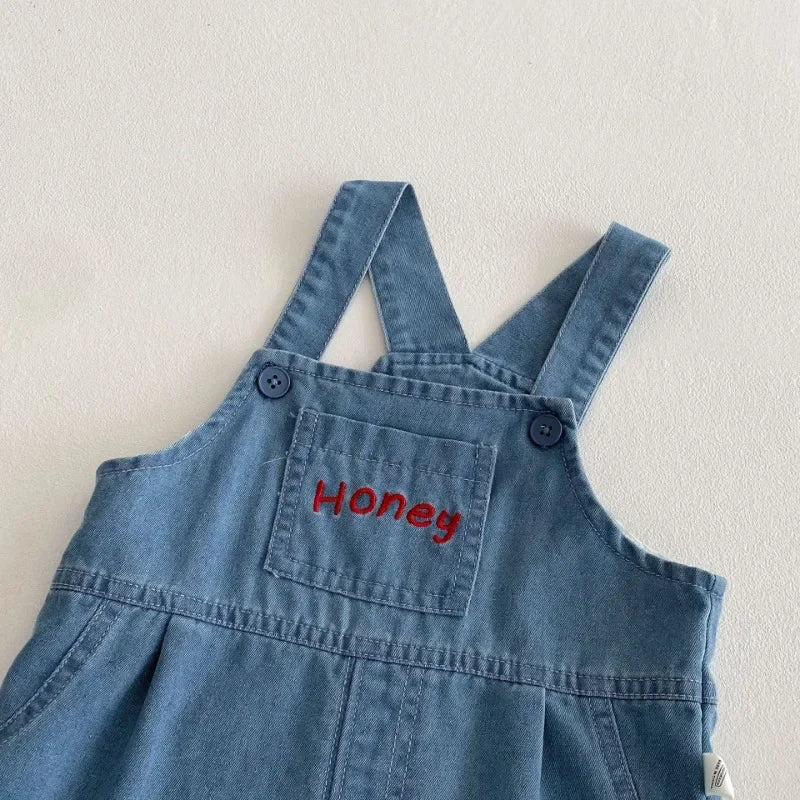 Camiseta y Short de Mezclilla con Tirantes de Winnie Pooh  (9m- 9T)