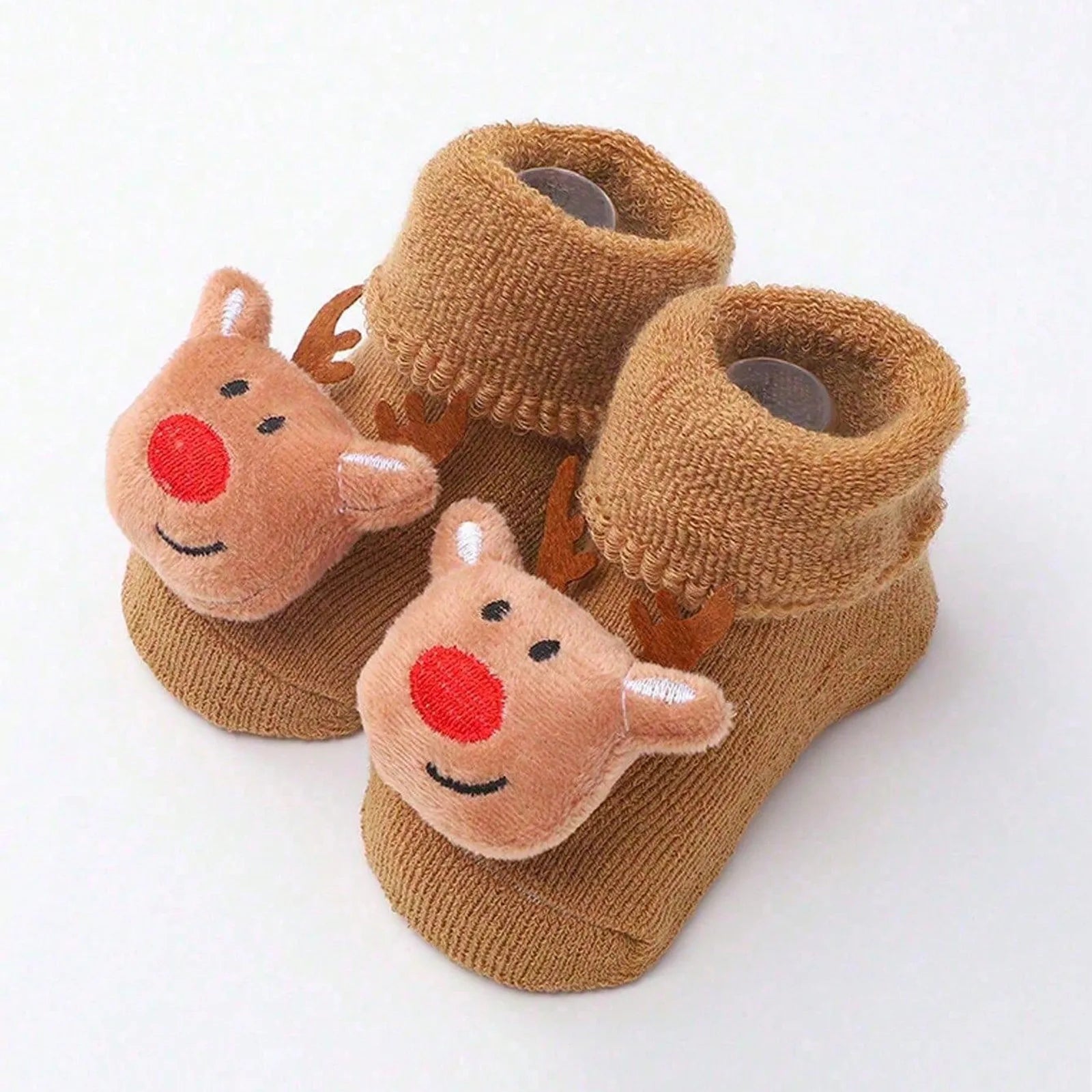 Calcetines Navideños Antideslizantes: La Magia y Seguridad en sus Primeros Pasos